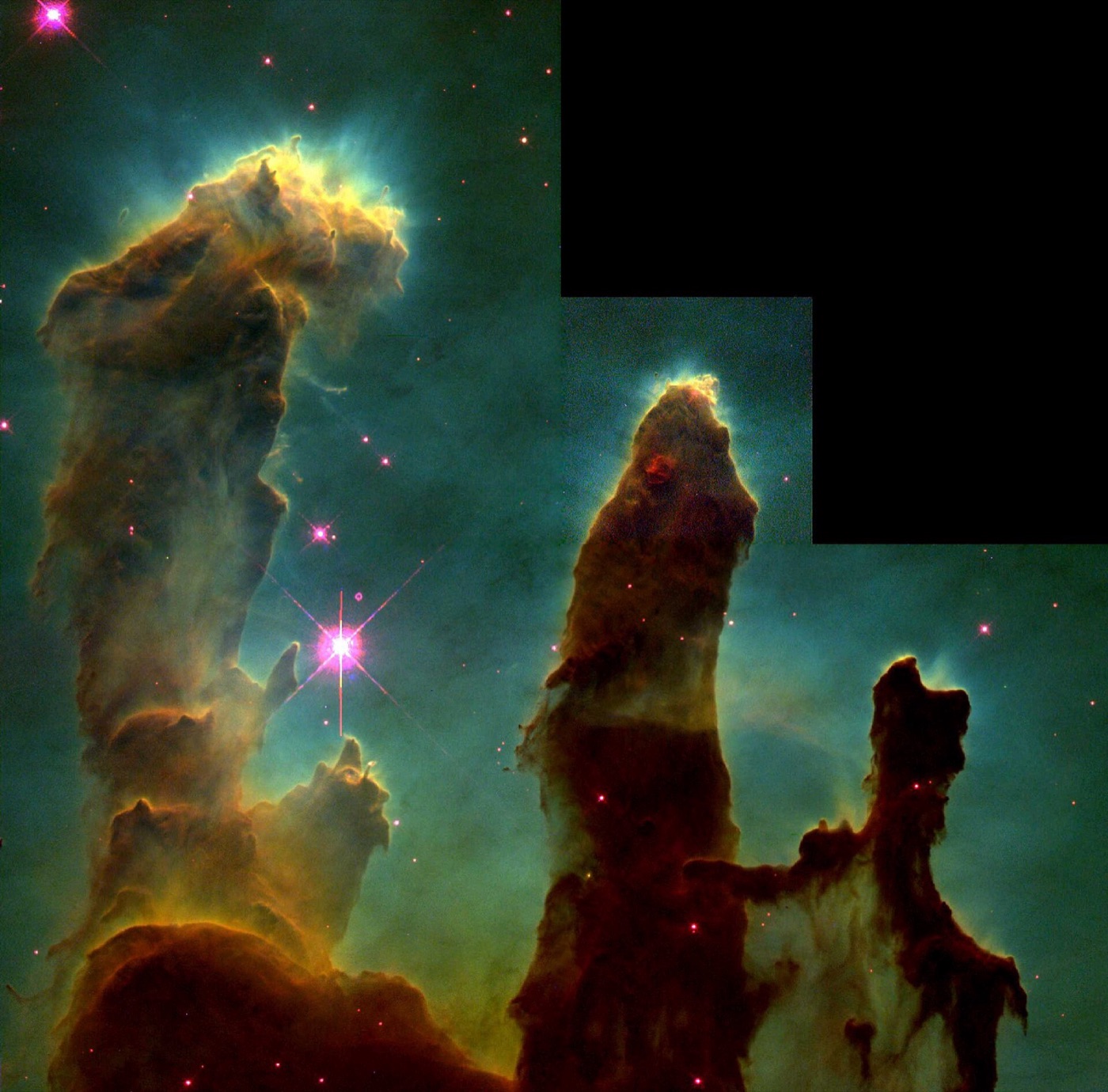 The Pillars of Creation: towering columns of gas and dust in the Eagle Nebula