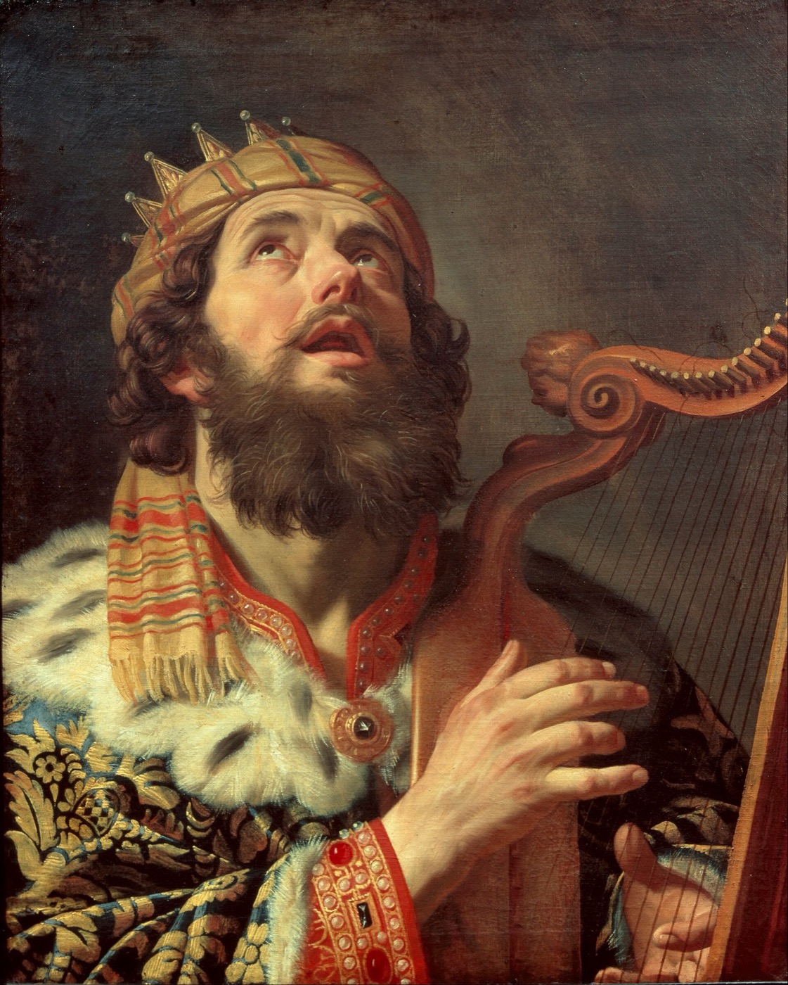 King David, crowned, playing the harp